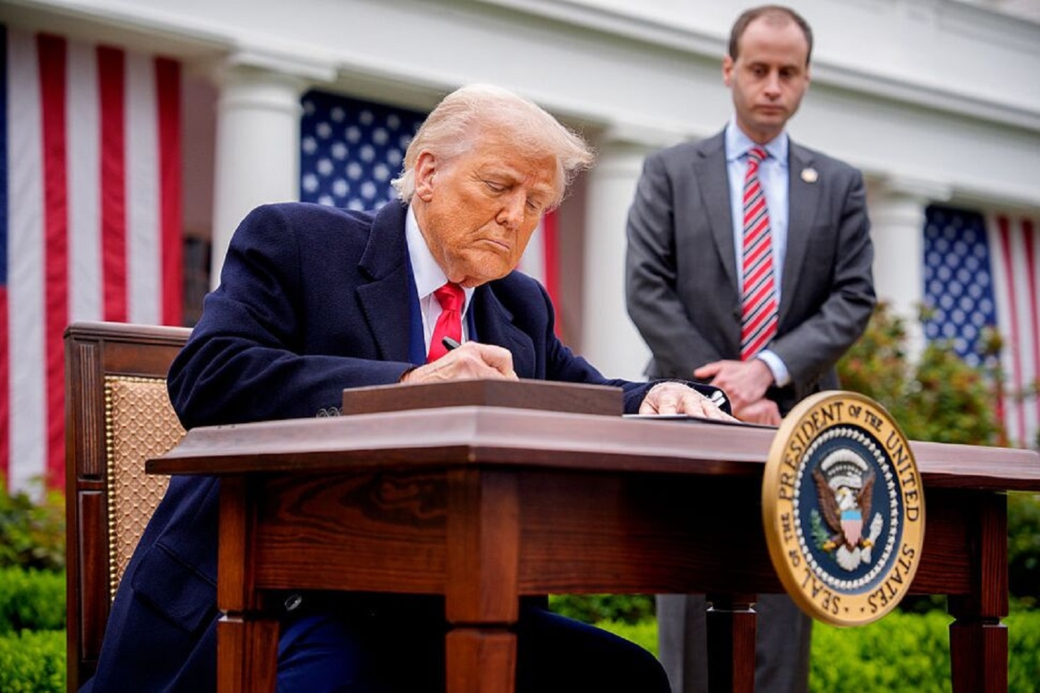 Trump signs sweeping new global tariffs